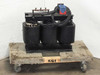 Varian MED 01-000062-00H 12kVA three-phase transformer — front-right view showing three-phase coil assembly, top-mounted tap switch, and full wiring harness loop