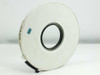 Syncron 9-Track tape reel – reverse side showing white plastic hub and NAB center with blue sticker