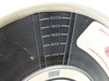 Syncron 9-Track tape reel showing molded footage indicator scale markings (400 to 2000 feet) on reel flange with Johnson Computer Application label visible