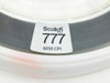 Scotch 777 6250 CPI label close-up on 9-track magnetic tape reel showing 3M Scotch brand marking and density specification