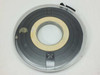 9-Track 1/2-inch magnetic tape reel removed from canister – front view showing wound tape, hub, and footage indicator markings