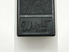Wright Line brand embossed canister latch/clip – close-up showing Wright Line logo on black plastic tape canister latch