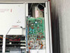 Tektronix 7912AD — interior left-side view showing high-voltage section with DANGER warning labels, large cylindrical component, and populated green circuit board