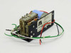 Standard Power 15B24H power supply – three-quarter view showing label side with transformer, blue capacitor, and wire harness