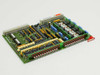 Netstal DIO 110.240.9216a Komplett board — opposite top-side angle showing relay array, DIP ICs, and gold-plated edge connector detail
