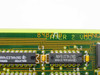 Wang 8987-0 PCB close-up of board marking '8987AB LAYER 2 WANG' with TI SN74LS164N and SN74ALS374AN ICs visible