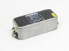 Schaffner FN2070-10-06 10A EMI line filter – left-side three-quarter view showing label and quick-connect terminals