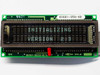 IEE 03601-95A-40 vacuum fluorescent display powered on showing INITIALIZING VERSION 2.3 in green VFD characters, front view with PCB and connector pins