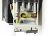 Nicolet Spectrometer Service Module – interior close-up of coolant loop showing copper fittings, yellow-green coolant tubing, and heat exchanger; warning label visible