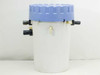 Plastican 6.5 Gallon White Housing Filter showing blue screw-on lid, two black barbed ports, and one small cream-colored fitting – front left view