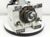 Singulus HC0110S – front spindle face view showing precision bearing hub, output shaft, and alignment pins; asset tag 696 visible