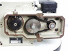 TC47 servo module with side panel removed revealing toothed belt, large drive sprocket, and idler pulley