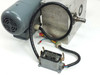 Taktomat IP 80 E indexing drive — rear view showing motor, multi-pin connector, wiring harness, and both output shaft ports