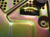 ITT Cortelco 250044-MBA-20M bottom chassis showing volume slider and ringer switch on gold-finished metal base