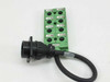 Phoenix Contact SACB-8/16 connection box — side/rear view showing M12 socket array and multi-pin round connector with black PUR cable