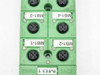 Phoenix Contact SACB connection box — bottom face showing M12 socket ports labeled MB1-1 through MB1-4 and Phoenix Contact SACB marking