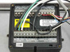 Interior terminal block of GF Signet 3-9030.111 showing AC IN 110V label, relay terminals RLY1-RLY4, serial and ISO inputs, part number and serial number label