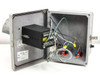 Interior of Allied Moulded enclosure with GF Signet pH controller module mounted inside, wiring harness, and relay wiring visible
