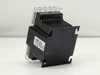 Hammond PT75QR 75VA control transformer — left side and rear view showing finned black transformer core, mounting bracket, and UL label