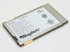 Megahertz XJ2288 PCMCIA modem rear label showing model number, FCC ID, and compliance text