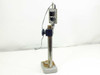 Mitutoyo IDF-112 Digimatic Indicator on Fowler stand – side/rear view showing indicator mounting clamp and adjustment knob