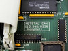 Netstal CAN 110.240.9335 Komplett PCB label close-up showing printed board identification with Toshiba TC55257DPL-85L SRAM chip visible