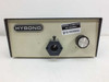 Hybond FOS 101 front panel view showing hexagonal fiber optic port, rotary intensity knob, and Natel Engineering periodic calibration not required sticker