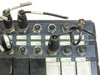 Base rail I/O connector panel close-up showing labeled M12 circular connectors for I:02 through I:13 and O:08 through O:12 channels with wiring leads