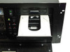 DiviCom NMS-RM-NM CD-ROM drive tray open showing disc tray and THESYS01 hard drive label below