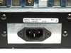 DiviCom NMS-RM-NM model label showing MODEL: NMS-RM-NM REV J and IEC C14 AC power inlet