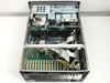 DiviCom NMS-RM-NM interior view with cover removed showing motherboard, expansion slots, ribbon cables, and chassis layout