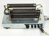 Interior view of load bank with top removed showing four Ohmite 300W wire-wound resistors mounted side by side and fuse panel