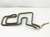 Single copper square-tube serpentine coil showing oxidized surface patina and the two white-insulated 0.5-inch port tube ends at left