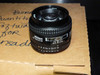 Nikon AF Nikkor 50mm f/1.4D lens included with Bio-Rad VersaDoc 5000 MP – front element view showing aperture and focus markings