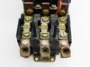 Square D 8536 SF01 motor starter — close-up of load-side terminal block showing three-pole copper contact lugs and brass terminal screws