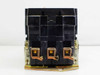 Square D 8536 SF01 motor starter — front view of contact arc chute assembly showing three-pole black housing and copper contact lugs on base