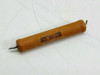 Caddock MS315 Power Film Resistor 500K Ohm – angled view showing Caddock logo and model markings on tan cylindrical body
