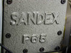 Sankyo Sandex P65 cast housing closeup showing embossed SANDEX P65 designation