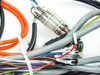 Wiring harness detail showing labeled wire terminals marked XDFO, sensor connectors, and multi-conductor cable bundle