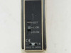 Close-up of Omron E3X-A11 bottom panel showing SET/L-ON/D-ON slide switch, CE mark, and polarity terminals, Made in Japan
