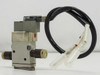 SMC SYJ512-5MZ-M5-F solenoid valve — front/right angle view showing solenoid body, red indicator dot, and push-in pneumatic fittings