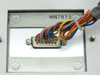 Interior rear of access panel showing male DB-15 connector with multi-conductor colored wires attached and part number WN7873 printed on panel