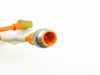 Close-up of M12 3-pole male straight connector end on Lumberg RST3-RKMWV/LEDA3-90/1.5 cordset showing pin contacts