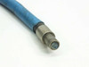 Close-up of the single input connector tip — blue vinyl jacket with metal ferrule showing fiber bundle face end-on, with discoloration visible on the fiber bundle face