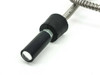 Close-up of the black rubber input light tip showing the fiber optic face and chrome flex cable connection — 15mm diameter cylindrical tip
