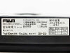 Fuji Electric BRR19N-02S rating label close-up showing model number, 200/220V, 100mA sensitivity, 0.1s operating time, and 3A contact ratings