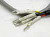 Wiring harness spade lug terminals close-up — multi-conductor cable with color-coded wires and insulated fork terminals