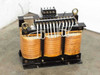 Kyoshin Keisoku 7 kVA transformer – rear three-quarter view showing three copper windings and full multi-tap primary terminal block