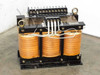 Kyoshin Keisoku 7 kVA three-phase transformer – front three-quarter view showing three copper coil windings and top terminal block