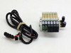 Koganei F10M6AJ pneumatic manifold assembly front view showing 6 valve stations and solenoid coils